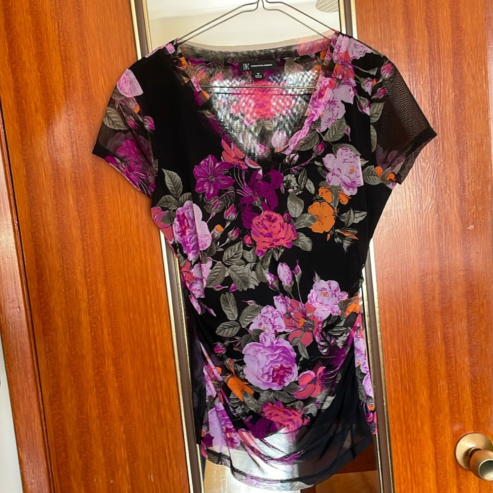 Beautiful flower print slightly mesh women’s top! Great for summer weather!